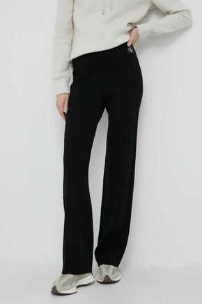 Donji dio trenirke Calvin Klein Jeans boja: crna - crna. Donji dio trenirke iz kolekcije Calvin Klein Jeans izrađene od glatke pletenine. Model izrađen od izuzetno ugodnog materijala na dodir.