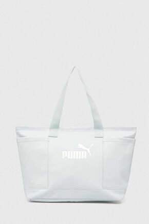Torba Puma - plava. Velika shopper torbica iz kolekcije Puma. na kopčanje model izrađen od ekološke kože. Lagan i udoban model idealan za svakodnevno nošenje.