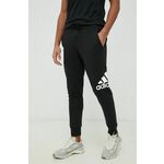 ADIDAS SPORTSWEAR Sportske hlače 'Essentials French Terry Tapered Cuff Logo' crna / bijela