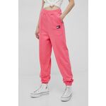 Pamučne hlače Tommy Jeans za žene, boja: ružičasta, glatki materijal - roza. Hlače iz kolekcije Tommy Jeans. Model izrađen od tanke, elastične pletenine.