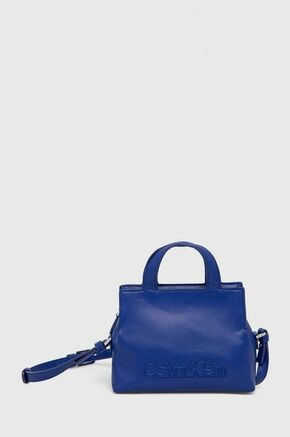 Torba Calvin Klein - plava. Mala torba iz kolekcije Calvin Klein. na kopčanje model izrađen od ekološke kože.