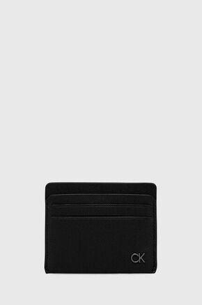 Kožni etui za kartice Calvin Klein boja: crna - crna. Etui za kartice iz kolekcije Calvin Klein. Model izrađen od prirodne kože.