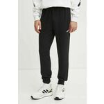 Donji dio trenirke adidas Feelcozy boja: crna, bez uzorka, JE3854